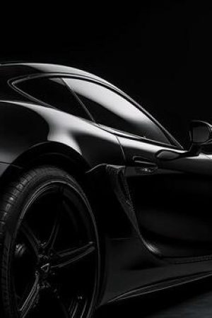 close-up-front-view-of-black-sports-car-with-copy-space-generative-ai-photo